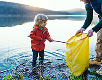 Child collecting rubbish image