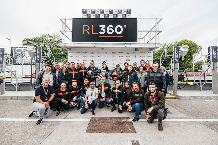 Rl360 staff with key advisers and TT Superstock winners at the Grandstand hospitality area