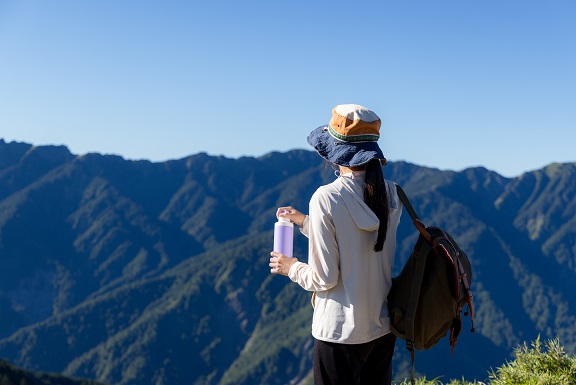 A woman admiring mountains