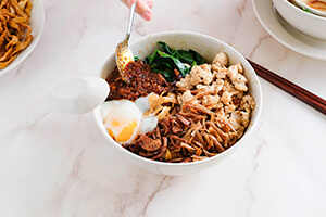 a bowl of chilli pan mee