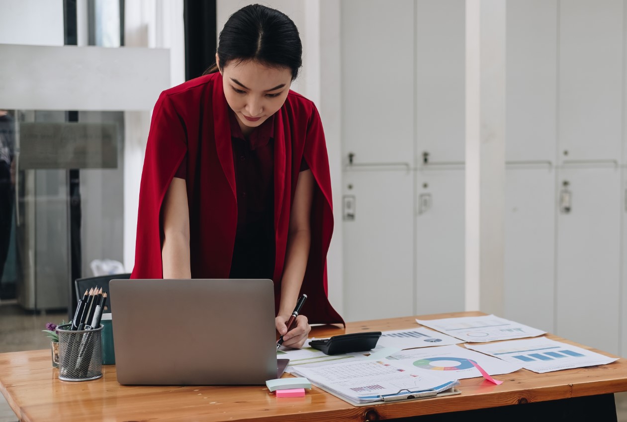 woman looking at laptop